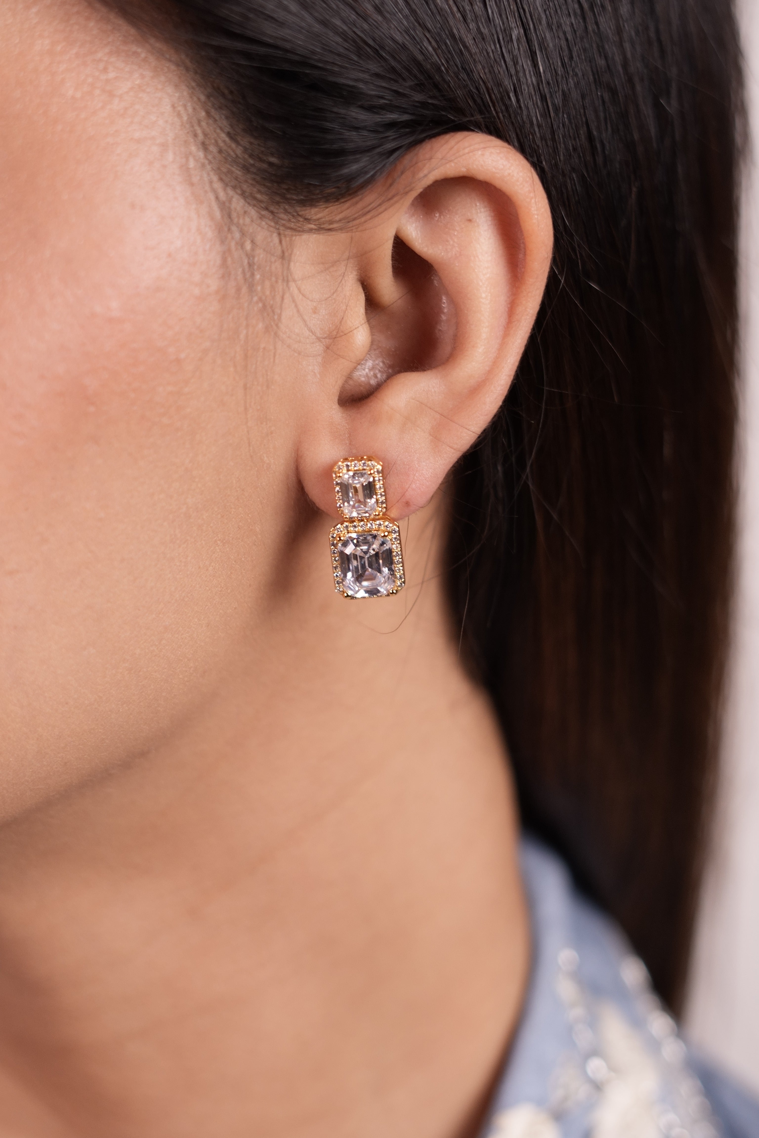 Double Tier Gold Solitaire earrings