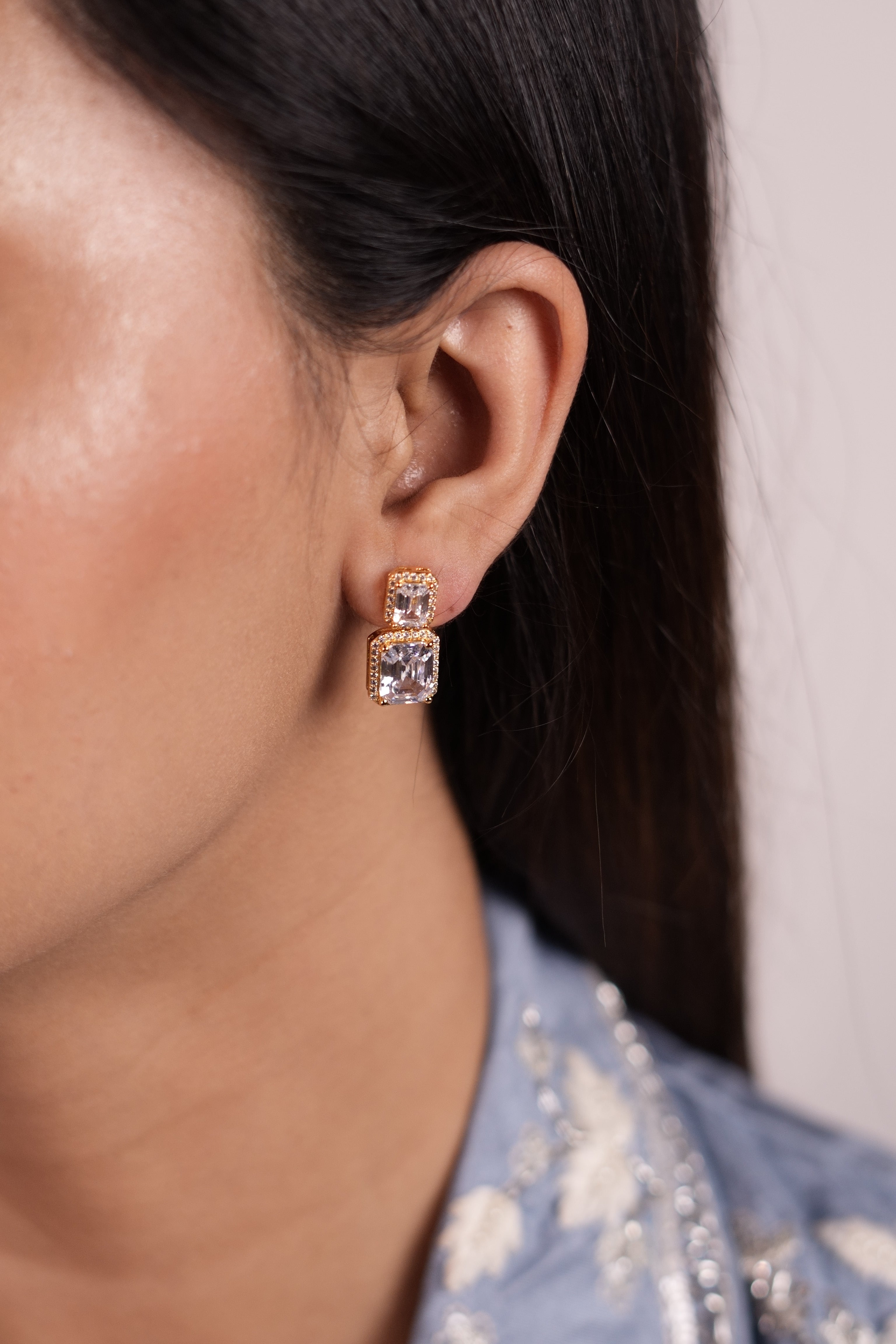 Double Tier Gold Solitaire earrings