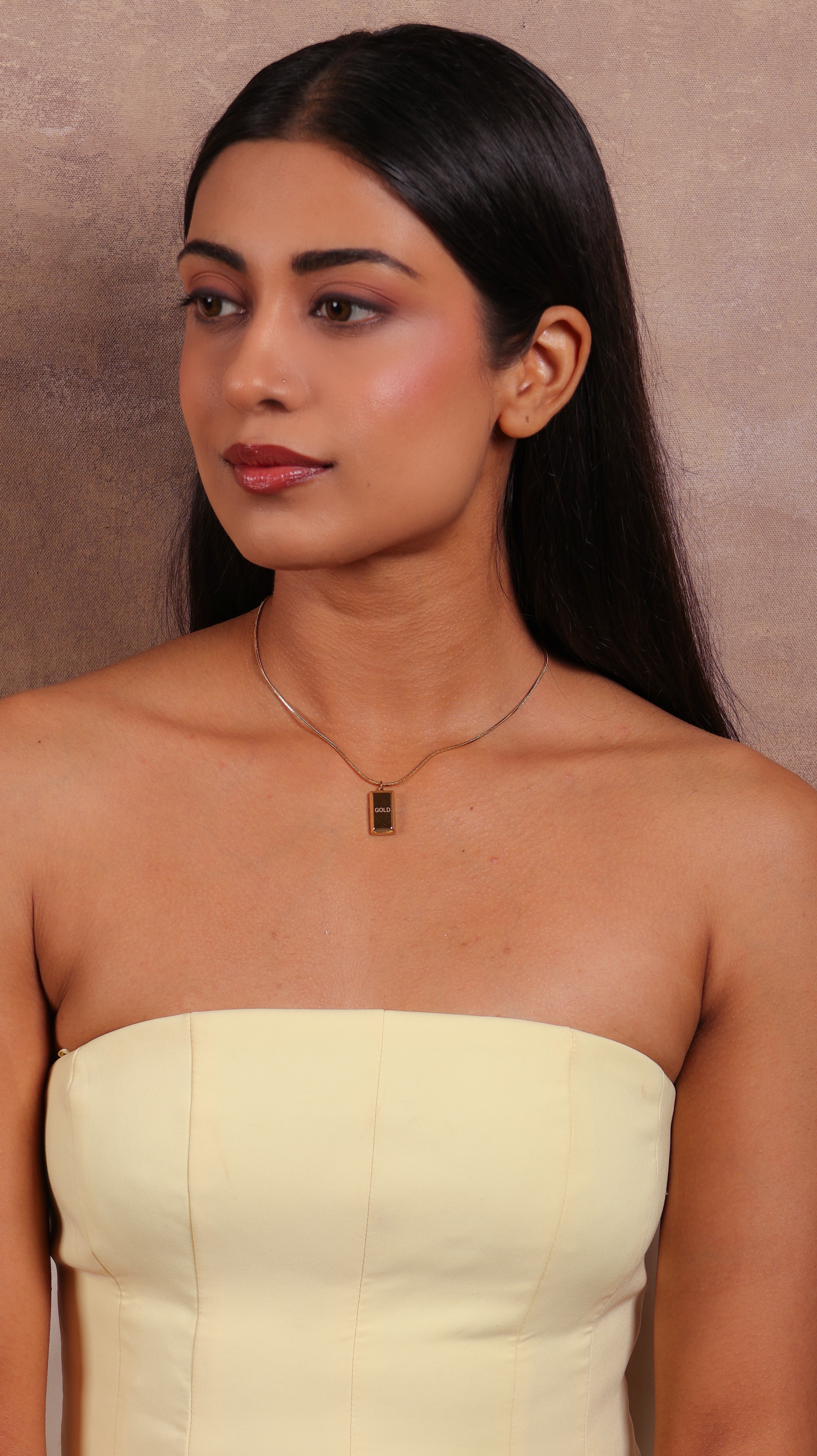 Gold biscuit pendant